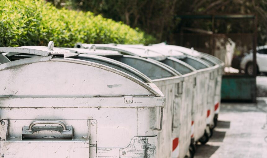 Waste containers on wheels for separate collection of garbage. Containers for temporarily storing